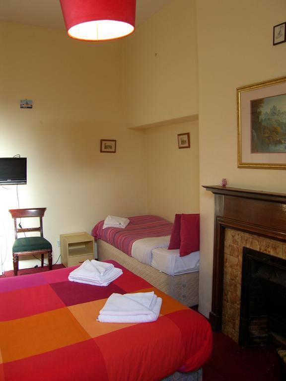Regis Guest House EDI Cameră foto