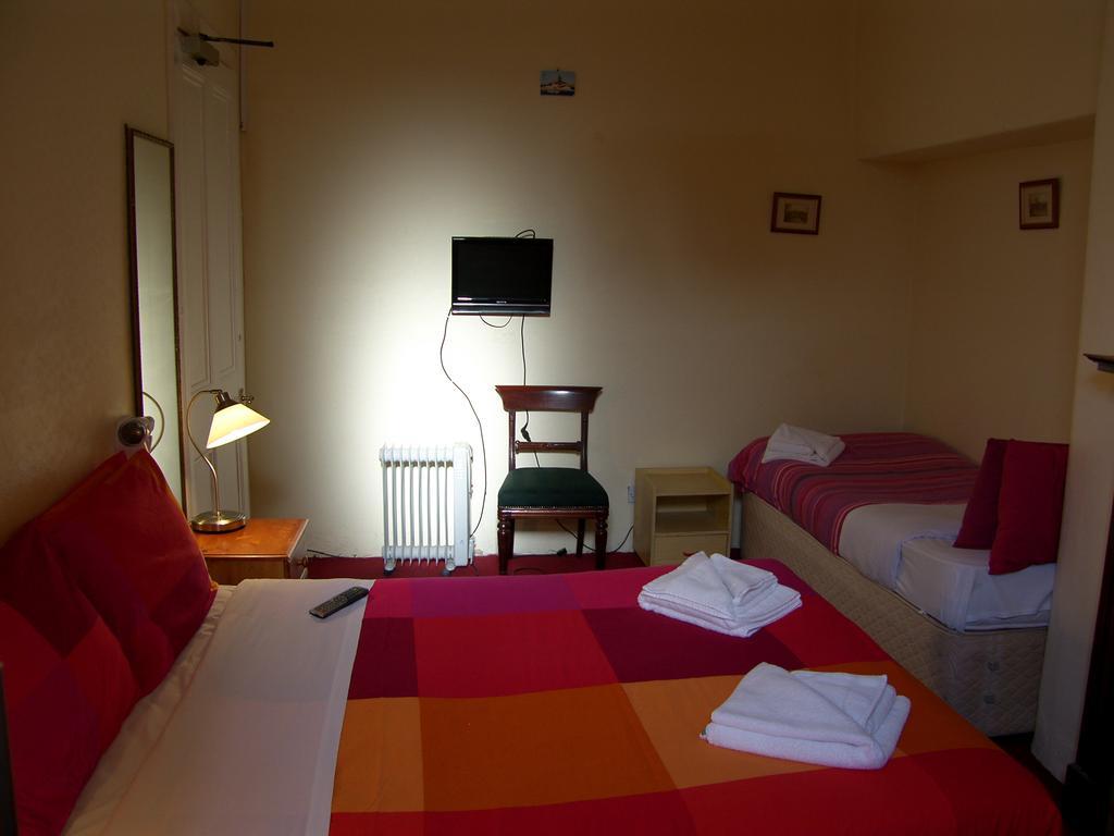 Regis Guest House EDI Cameră foto